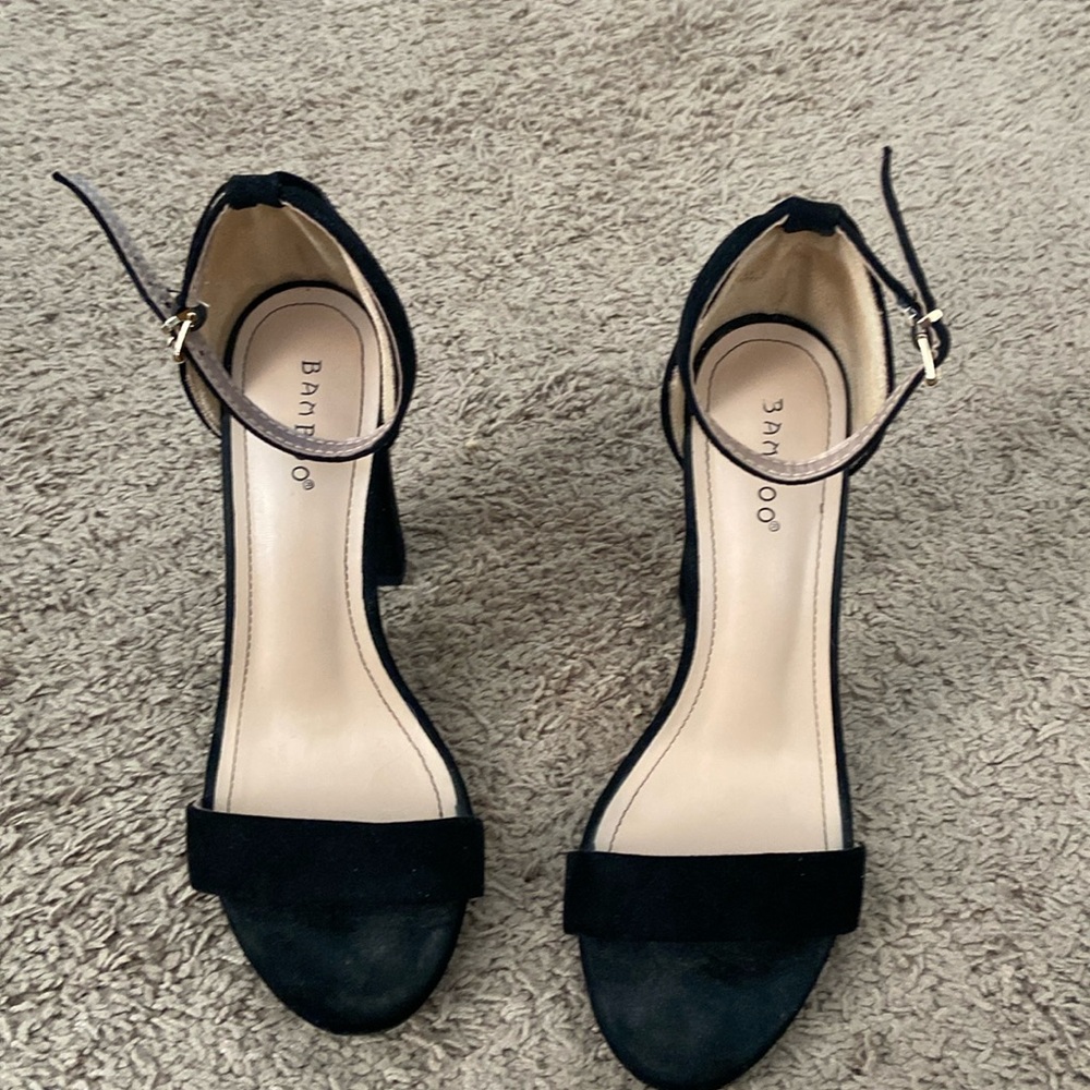 Black suede high heels